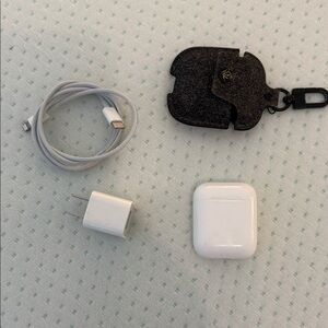 Apple AirPods (1st Generation) with Charging Cable plus Twelve South Case